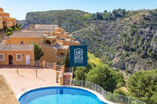 Apartament a Cumbre del Sol. Apartamento con vistas panorámicas en tranquila urbanización de