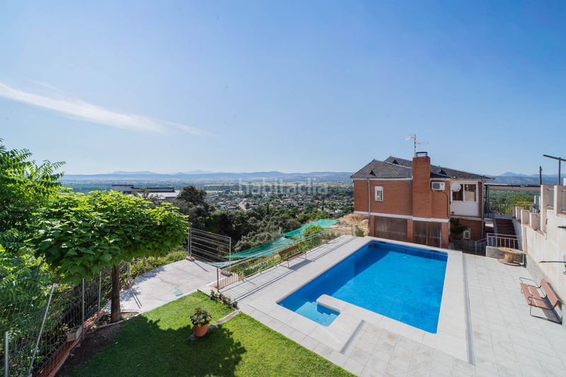 Foto d02b05f7-a938-49fc-a15b-8815b0c57511. Xalet amb xemeneia calefacció aparcament piscina a Calalberche