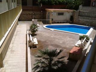 Apartament  De carles buïgas. Fantástico apartamento cerca de la playa con piscina comunitaria