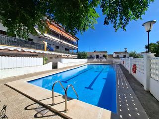 Appartamento  Gracia. Planta baja con dos grandes terrazas y piscina a 350 metros del