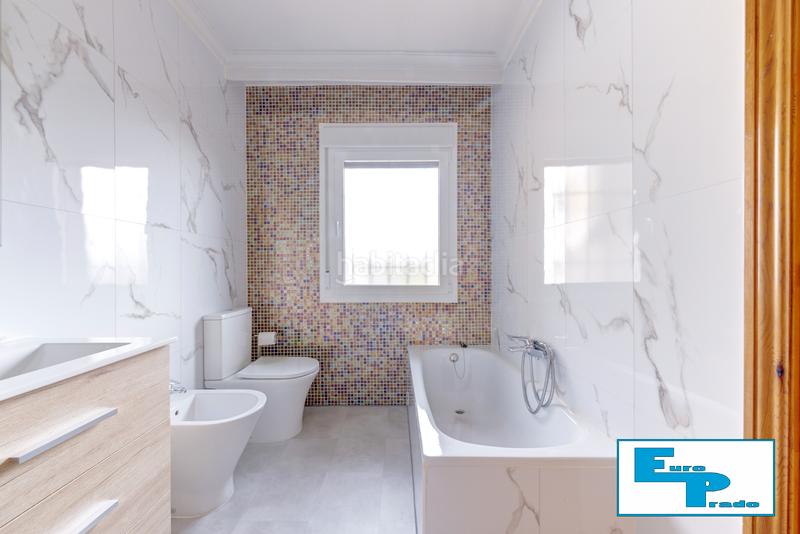 Foto 6c386aa4-55f8-470b-9c78-eb9eef75b90d. Casa aparellada amb xemeneia calefacció aparcament piscina a Rozas de Madrid (Las)