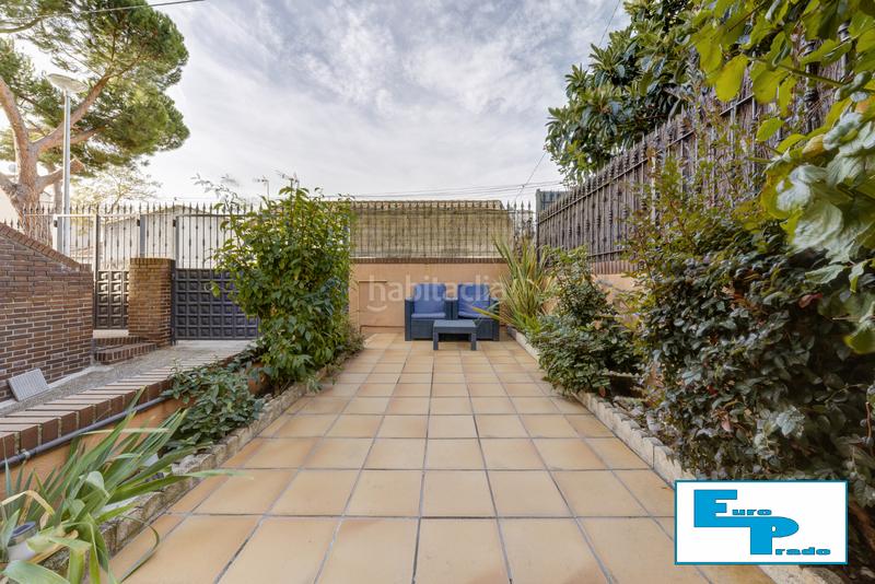 Foto 876edb9e-b115-49f6-a79d-3a39661b99a7. Casa aparellada amb xemeneia calefacció aparcament piscina a Rozas de Madrid (Las)