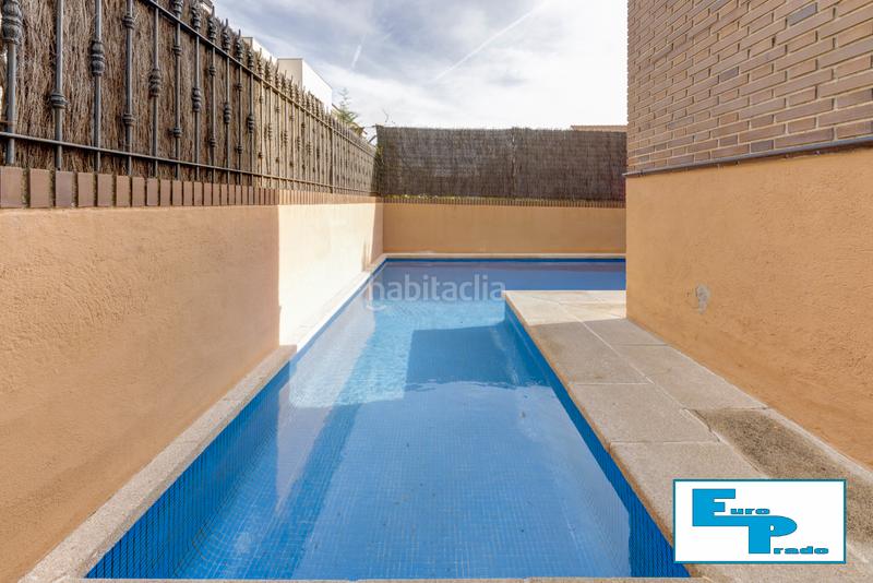 Foto 8ec2143d-eac5-4d79-adb8-23b843fdf110. Casa aparellada amb xemeneia calefacció aparcament piscina a Rozas de Madrid (Las)