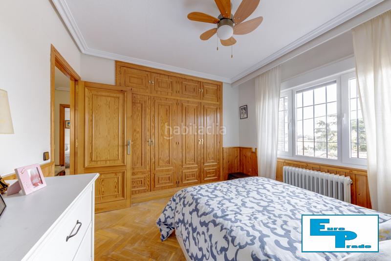 Foto 9c6f568a-dfdd-4acf-a69b-0e337616a4fc. Casa aparellada amb xemeneia calefacció aparcament piscina a Rozas de Madrid (Las)