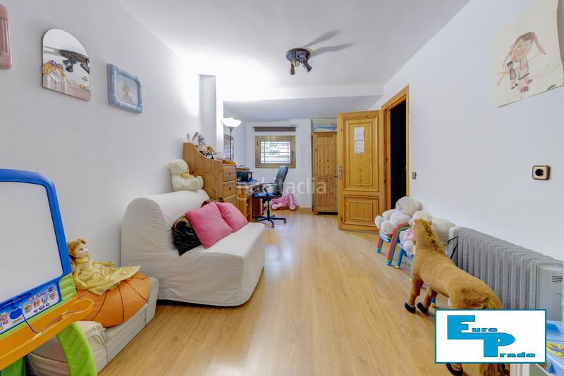 Foto 9e85061f-3e2c-4926-b2b9-a7fbf39ab11d. Casa aparellada amb xemeneia calefacció aparcament piscina a Rozas de Madrid (Las)