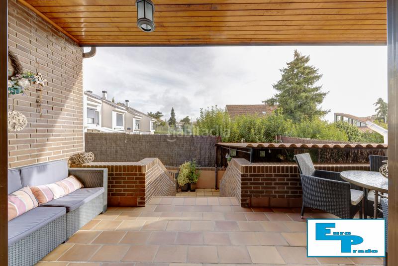 Foto c3808094-f4d5-42b3-b02d-6956a0061f47. Casa aparellada amb xemeneia calefacció aparcament piscina a Rozas de Madrid (Las)