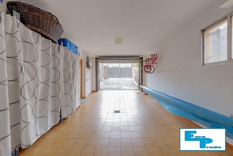 Foto d41c6248-8ce3-4707-9179-e9c2f7d12a11. Casa aparellada amb xemeneia calefacció aparcament piscina a Rozas de Madrid (Las)