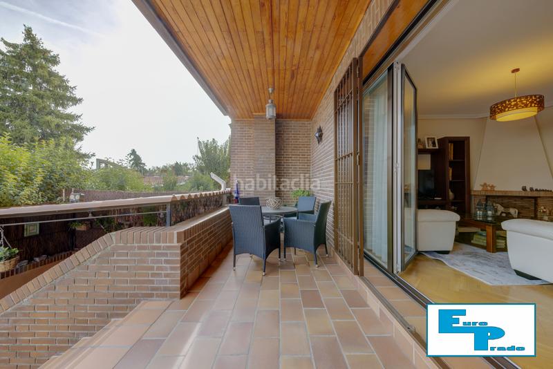 Foto dbd635a7-9ee4-4353-a49d-1a8c102e91e8. Casa aparellada amb xemeneia calefacció aparcament piscina a Rozas de Madrid (Las)