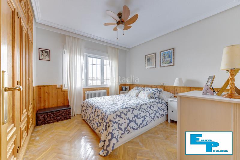 Foto ec52e6e7-f1c4-4827-b1eb-4ebbba41198f. Casa aparellada amb xemeneia calefacció aparcament piscina a Rozas de Madrid (Las)