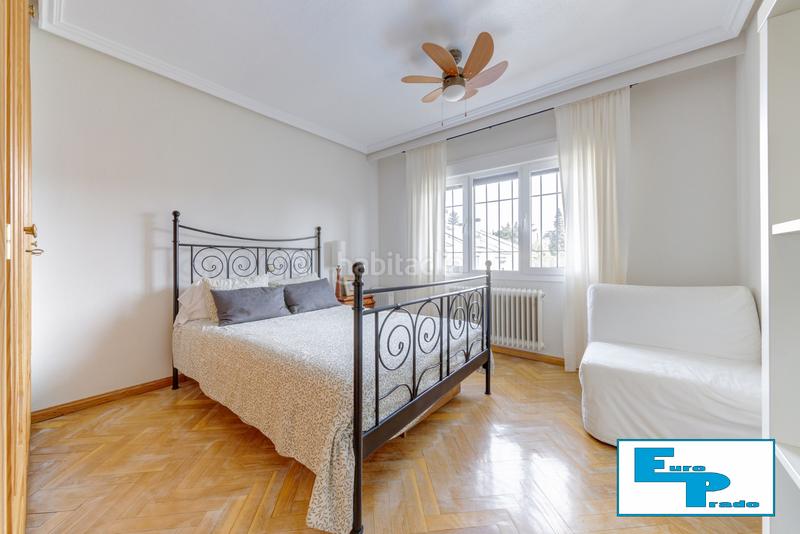 Foto f9690371-17ac-4bd0-ac1f-99db1af66d70. Casa aparellada amb xemeneia calefacció aparcament piscina a Rozas de Madrid (Las)