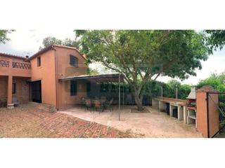 Location Mas à Flaçà. Alquiler temporal de vivienda rústica con jardín y piscina en el