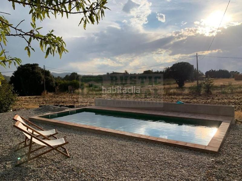 Foto bc9c8876-c531-47b4-88d3-77ad05699202. Rent country house with heating pool in Flaçà