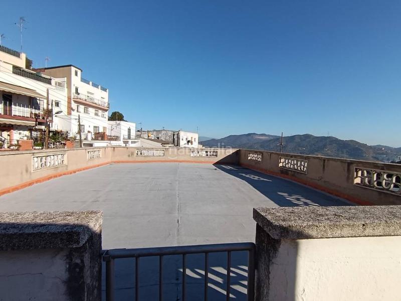 Foto 201e300c-75f0-4b59-a45d-32e0aab43cbb. Casa amb aparcament piscina a Torre Baró Barcelona