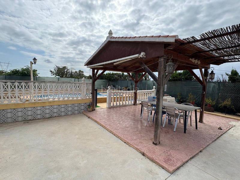 Foto 42828ec3-dcc4-45cf-9165-cb5677b923a3. Casa amb aparcament piscina a La Marina Elche / Elx