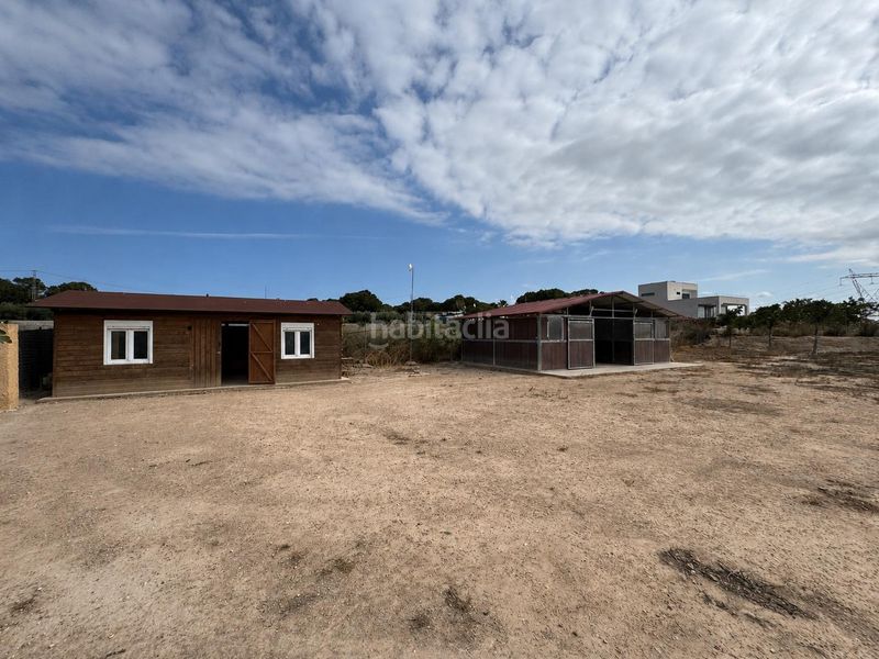 Foto c54c2dea-01fb-40f7-838f-3ac2b49467fe. Casa amb aparcament piscina a La Marina Elche / Elx