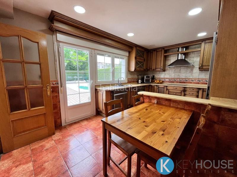 Foto f568fd33-b728-4670-9650-a8e1c2e54346. Casa amb piscina a Villar del Olmo