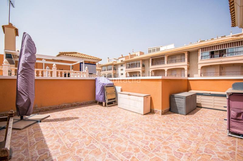 Foto 2d8c4838-f7bf-43e8-afdb-77b1abc1f8c8. Zweistöckige wohnung mit parking pool in Playa Flamenca Orihuela