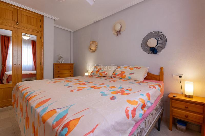 Foto b8a9b9d5-561e-42d9-a6cb-4812a28e6814. Zweistöckige wohnung mit parking pool in Playa Flamenca Orihuela