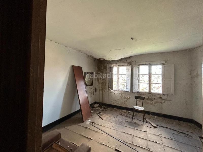 Foto 23d5d328-467e-4ed0-a8f0-e34456477aa3. Casa aparellada amb aparcament a Campus Norte - San Caetano Santiago de Compostela