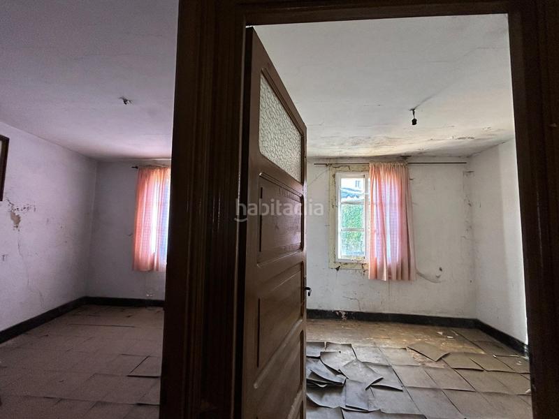 Foto 6fd1981f-6311-4dd6-827b-330ee9a162b1. Casa aparellada amb aparcament a Campus Norte - San Caetano Santiago de Compostela