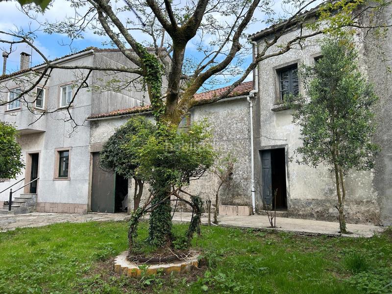 Foto 988a6256-0f31-4d4d-bbca-c9022e0ae9a2. Casa aparellada amb aparcament a Campus Norte - San Caetano Santiago de Compostela