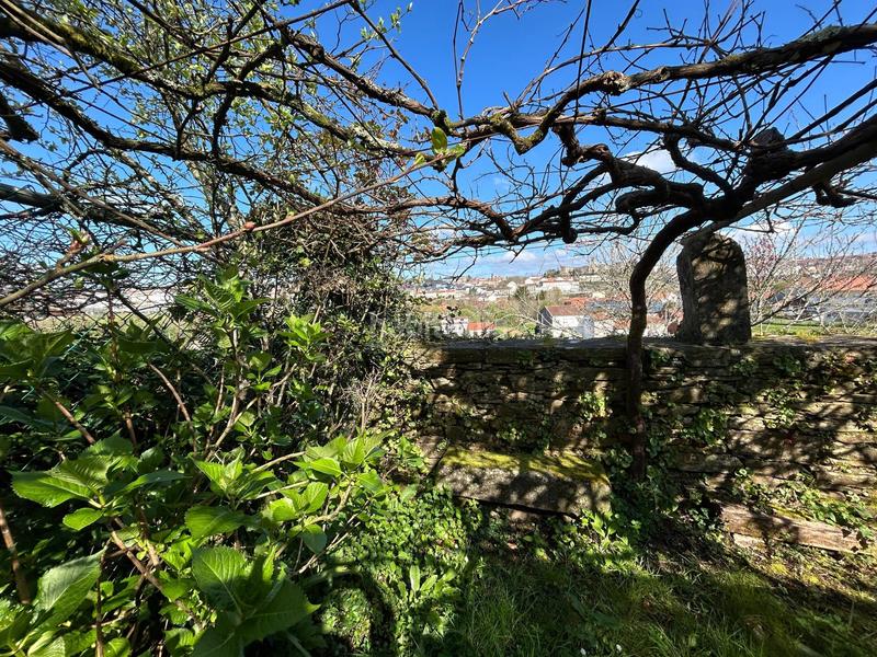 Foto a303e95d-7bde-4b57-b093-016ec0199f78. Casa aparellada amb aparcament a Campus Norte - San Caetano Santiago de Compostela