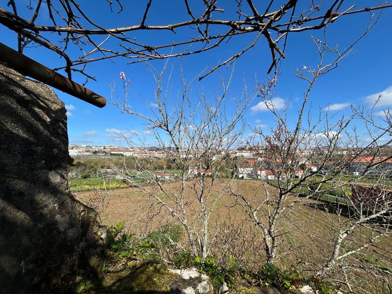 Foto c9aed7a2-4d0a-4468-b76c-461c4faabcc2. Casa aparellada amb aparcament a Campus Norte - San Caetano Santiago de Compostela