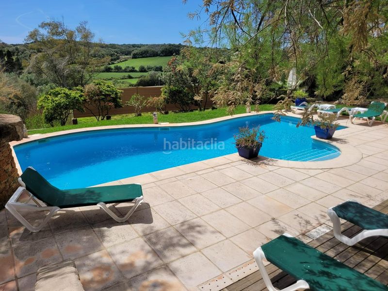 Foto 1875a908-1b8d-404a-8fb5-0f2ae4c4bf8c. Casa amb calefacció aparcament piscina a Es Grau-Serra Morena Maó / Mahón