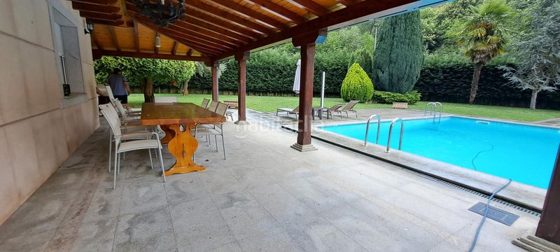 Foto af82c433-1c8d-45a7-b494-57264fe000a2. Casa amb calefacció piscina a Área Rural Sur Ponferrada