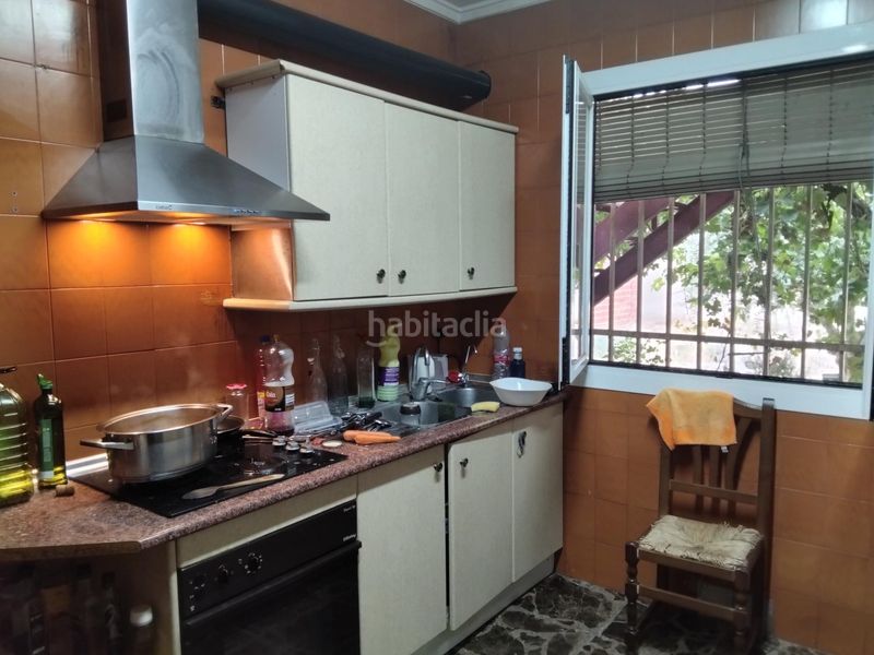 Foto 03ae901e-88d9-42cb-8107-969e08a40fab. Casa aparellada amb aparcament a Campo de Criptana