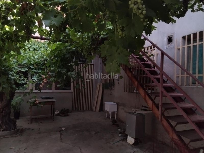Foto ed300e02-6085-45d7-9b90-4ca9068f1472. Casa aparellada amb aparcament a Campo de Criptana