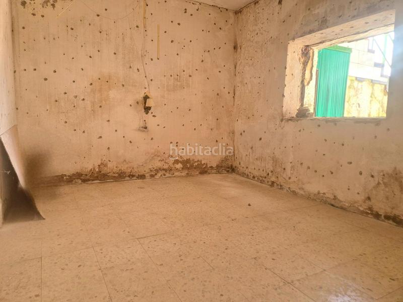 Foto 0b326594-c046-4dc8-9385-1a5f4fe0acf5. Reihenhaus mit parking in Montijo