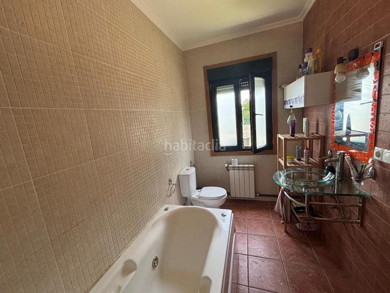 Foto 0dc5bbf0-3d1d-41ea-b48a-f57082bf9b6a. Casa pareada en Ponteareas