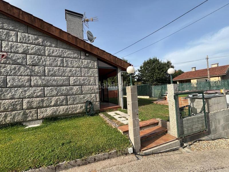 Foto 596c73fd-b4d9-4723-b062-07c929e6f585. Casa pareada en Ponteareas
