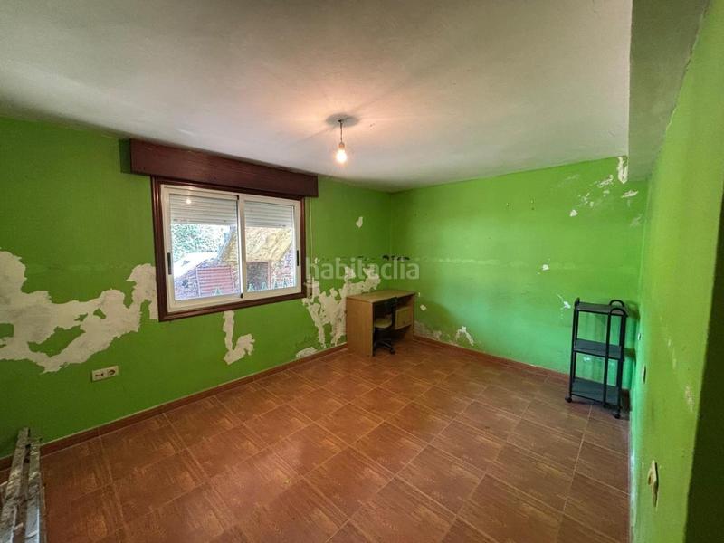 Foto 9a5d87c9-c8cc-48fe-9438-0151e2f7d30d. Casa amb aparcament a Redondela