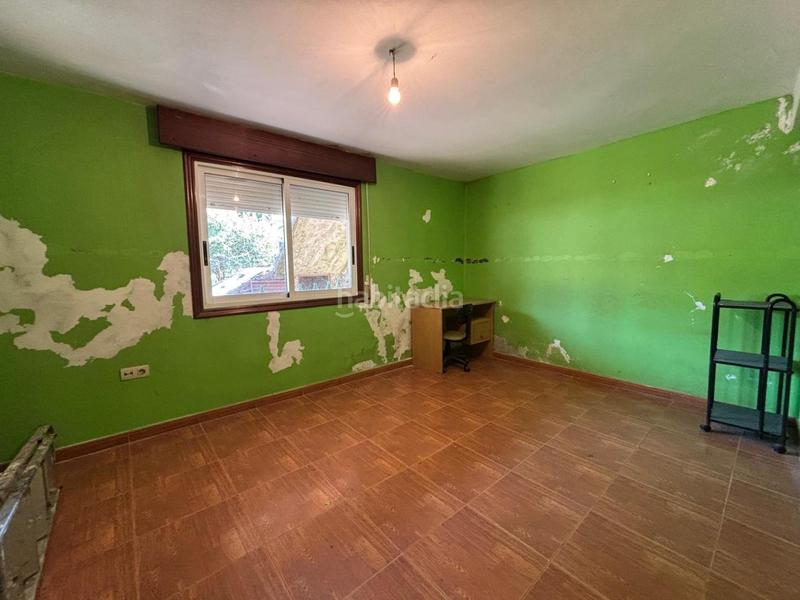 Foto ac880347-5fd0-40d8-93ee-9099ca9eb744. Casa amb aparcament a Redondela
