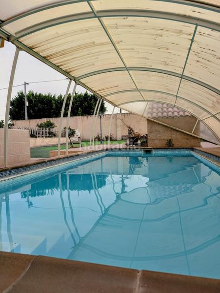 Foto 82301908-1cb3-4e8c-9845-eac405fe58e3. Maison avec parking piscine dans Cañada del Fenollar Alicante