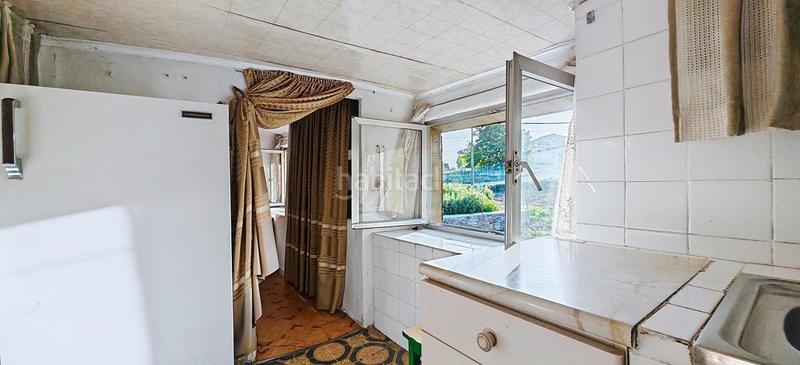 Foto d5586392-3ca9-42e0-8d29-add9f1f116cb. Casa adosada en Grado