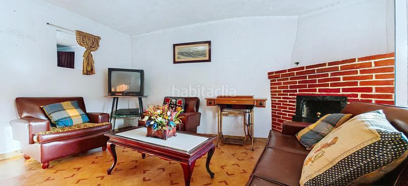 Foto d717e87a-6c7d-4f59-bad5-bd9a2f745d25. Casa adosada en Grado