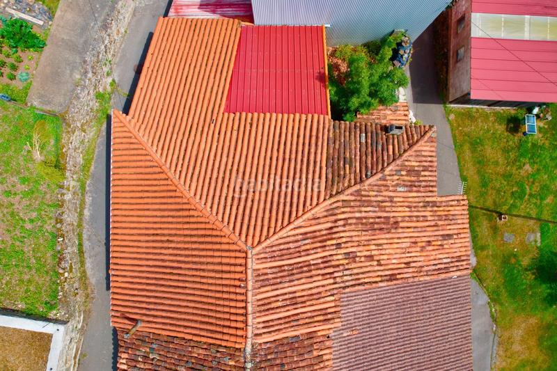 Foto f568435f-732d-49d2-a47a-bef91d9313e6. Casa adosada en Grado