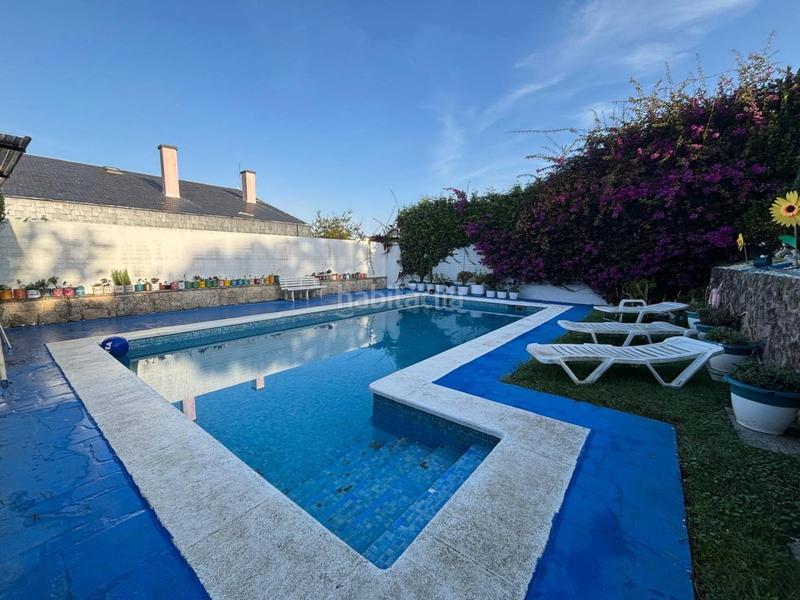 Foto 0df674c7-af00-4fe7-ba11-501468998557. Casa con riscaldamento parcheggio piscina in Panxón Nigrán