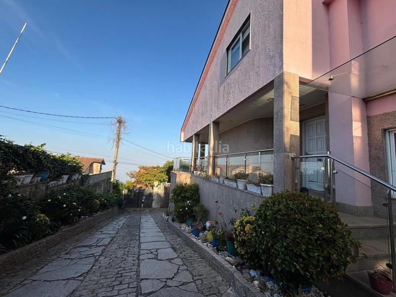 Foto 404c570e-8000-4535-b95a-2d39cb080126. Casa con riscaldamento parcheggio piscina in Panxón Nigrán