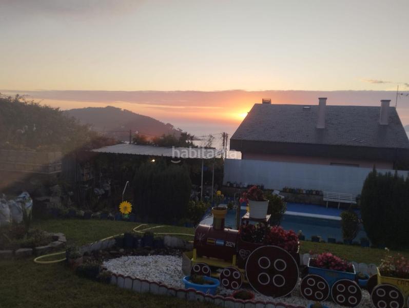 Foto 7e3d1058-2240-49d7-b7b4-c6d6d8e64a9e. Maison avec chauffage parking piscine dans Panxón Nigrán