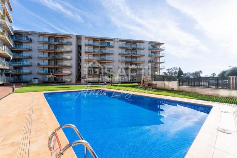 Foto 0a621274-ecac-482e-bfc1-a2e03de8c836. Apartment with heating parking pool in Santa Margarida Roses