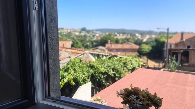 Foto 983ddcc1-0a8a-42cd-ba69-33d4db7331c0. Casa amb calefacció aparcament a Parroquias de Santiago Santiago de Compostela