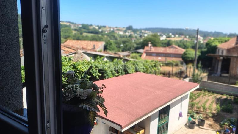 Foto 9e482c52-0347-45cc-8b42-23a1ec590f6d. Casa amb calefacció aparcament a Parroquias de Santiago Santiago de Compostela