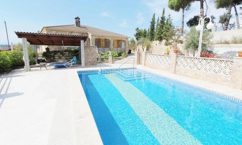 Foto 0bc81adb-5cc3-4f94-af5d-24632c378846. Casa con riscaldamento parcheggio in Aiguaviva Parc Vidreres