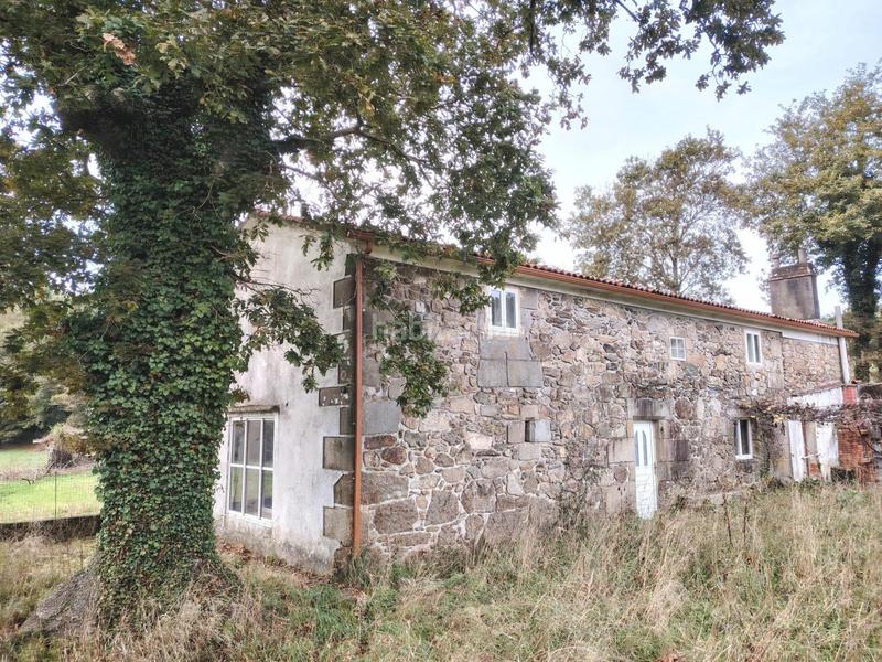 Foto f2b0d58a-0945-49eb-8a80-63dc2c83e620. Masia a Negreira