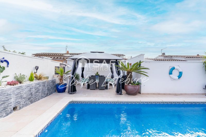 Foto 4f0eb5f7-d343-4587-8364-7136f04e8ccf. Casa amb calefacció aparcament piscina a Puigmal - Mas Nou Empuriabrava