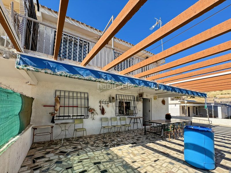 Foto 4ab600fe-0f9a-49ce-9605-76abd65cb9e7. Casa adossada amb aparcament a Pueblo Acantilado-Lanuza Campello (el)